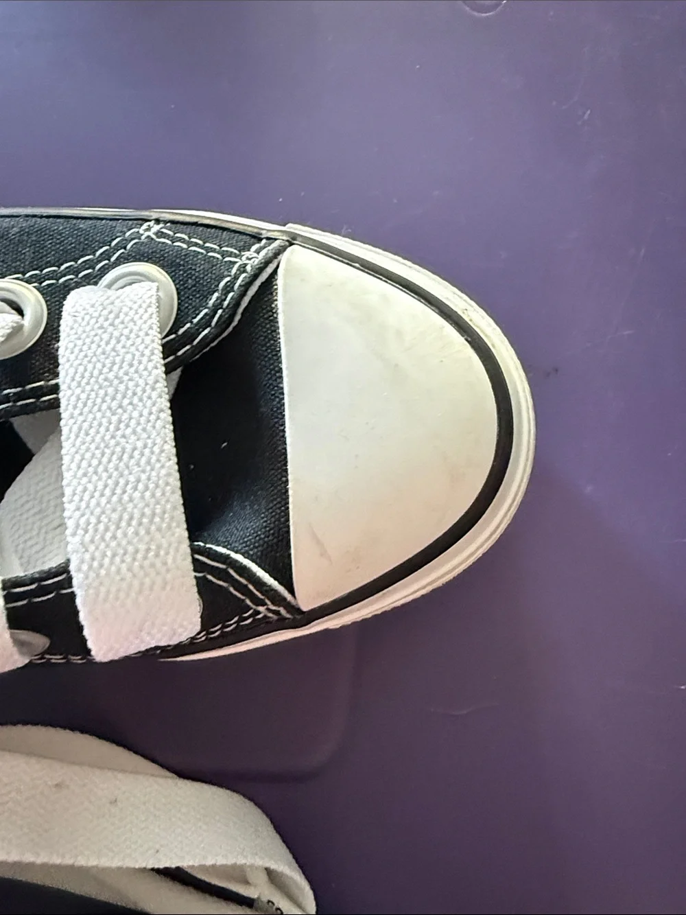 Converse women’s Black and White High-Top Sneakers